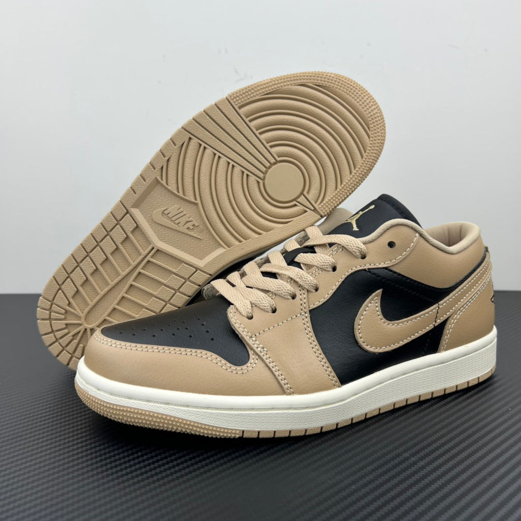 Low-top sneakers with tan rubber outsole and dark navy swoosh, lace-up.