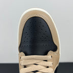 Low-top sneaker toe, tan leather with perforations and dark navy interior.