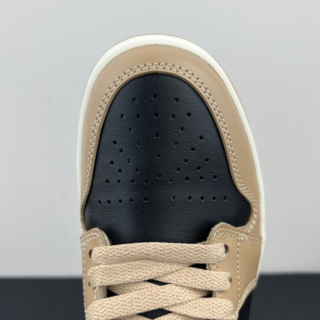 Low-top sneaker toe, tan leather with perforations and dark navy interior.
