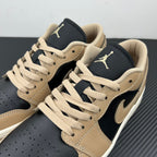 Low-top sneakers, tan-and-navy leather with tan laces and Air Jordan tongue logo.