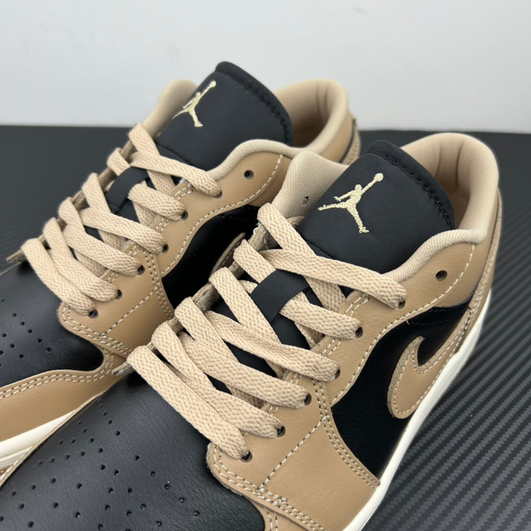 Low-top sneakers, tan-and-navy leather with tan laces and Air Jordan tongue logo.