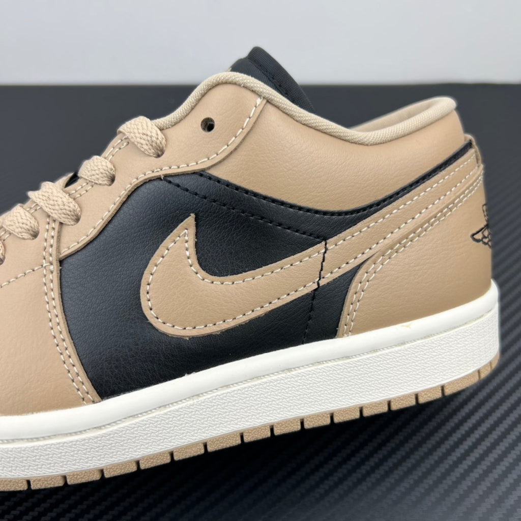 Low-top sneakers side profile, tan leather with dark navy swoosh and white midsole.