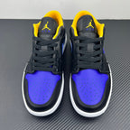 Low-top sneaker pair facing front, dark leather with purple toe, yellow collar lining, white sole.