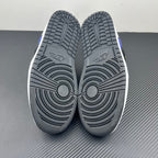 Low-top sneaker outsole pair with textured tread and circular traction patterns.
