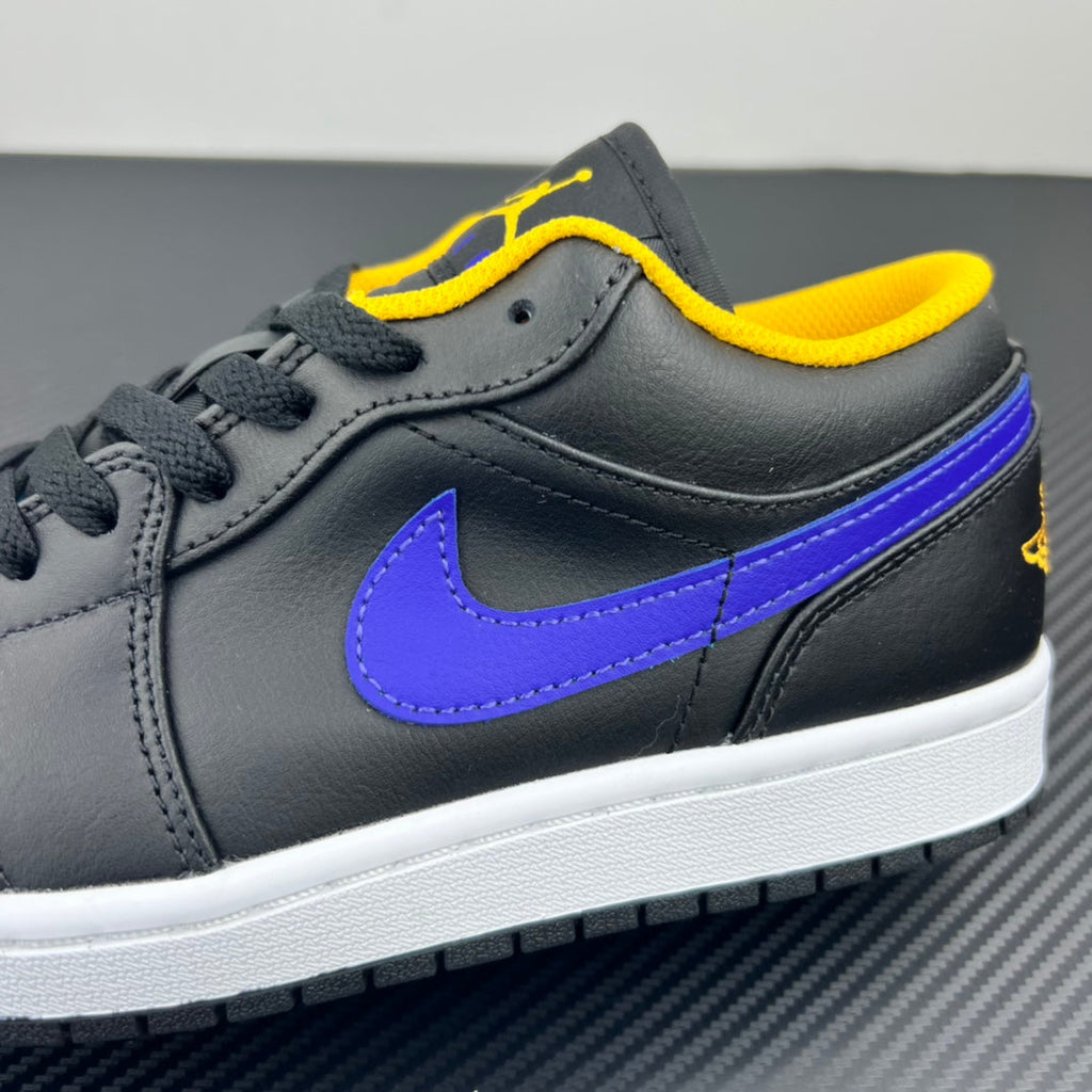 Low-top sneaker quarter view with purple Swoosh, dark leather, yellow collar stitch, white midsole.