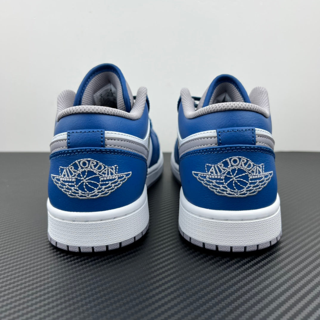 Air Jordan 1 Low sneakers, back view pair with blue heel panels and white outsole