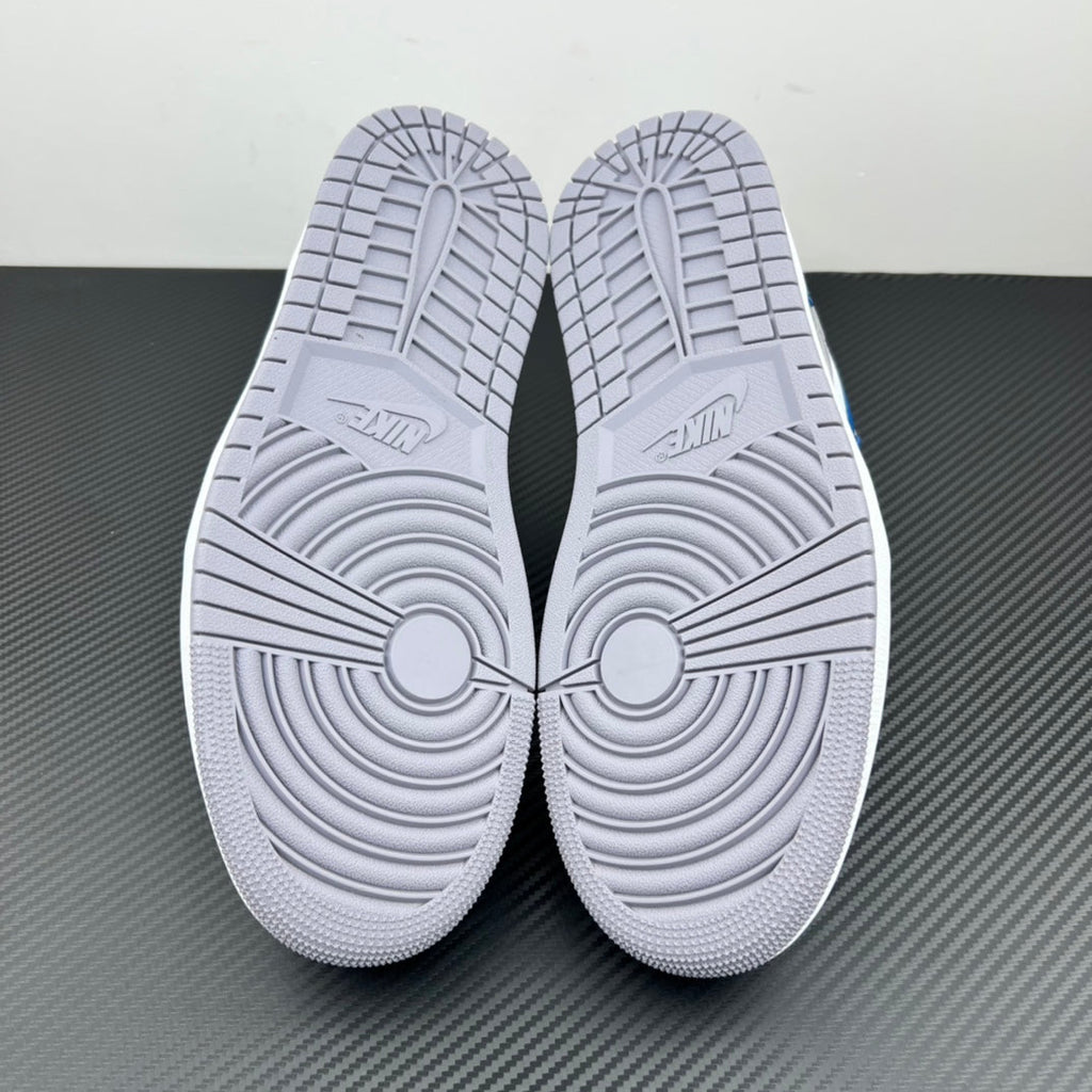 Air Jordan 1 Low sneakers, white outsole bottoms with textured traction pattern