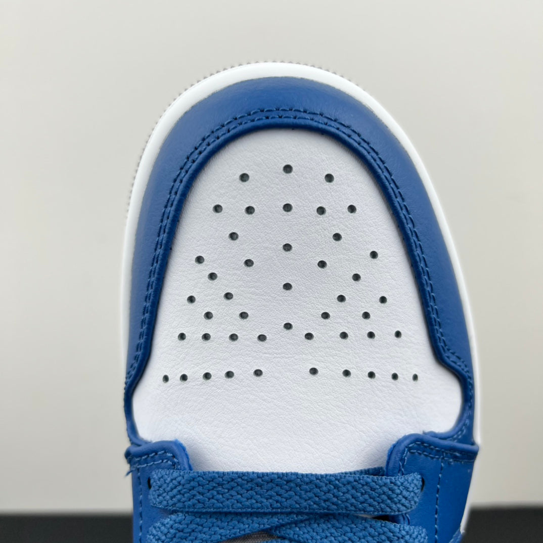 Air Jordan 1 Low toe box close-up in white with perforations and blue trim