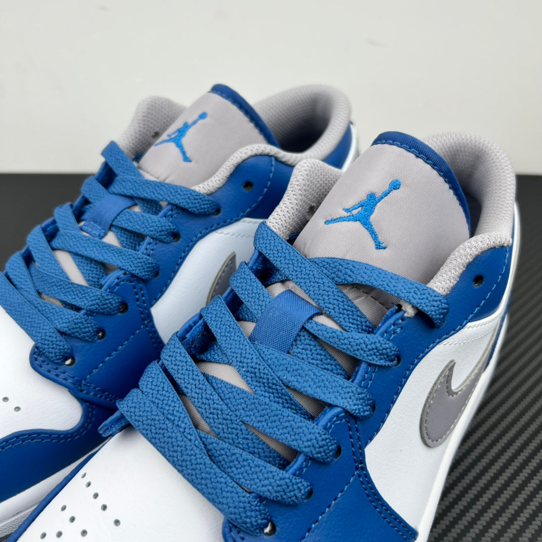 Air Jordan 1 Low sneakers with blue laces and tongue panels showing Jumpman logo