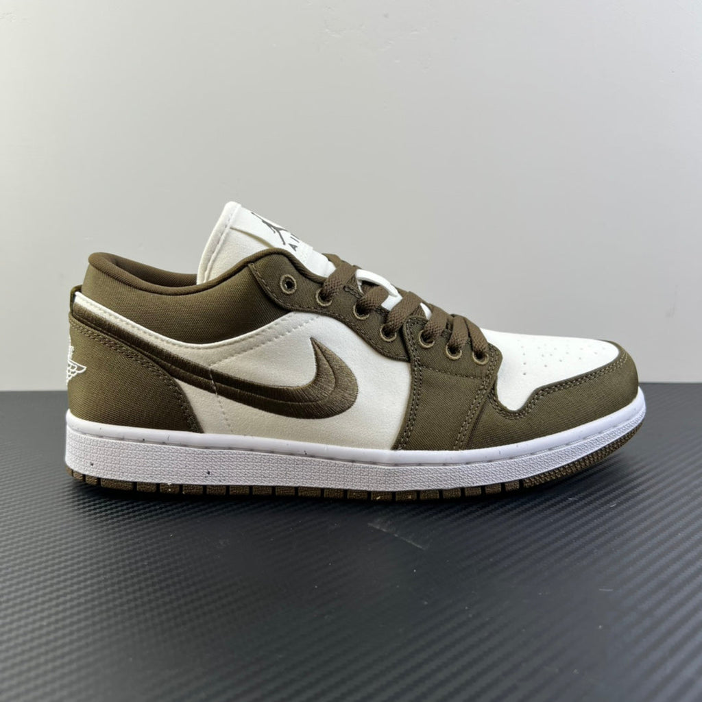 Low-top sneakers in olive and white, side view with Swoosh and perforated toe panel