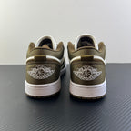 Back view of low-top sneakers in olive and white with winged logo on heel