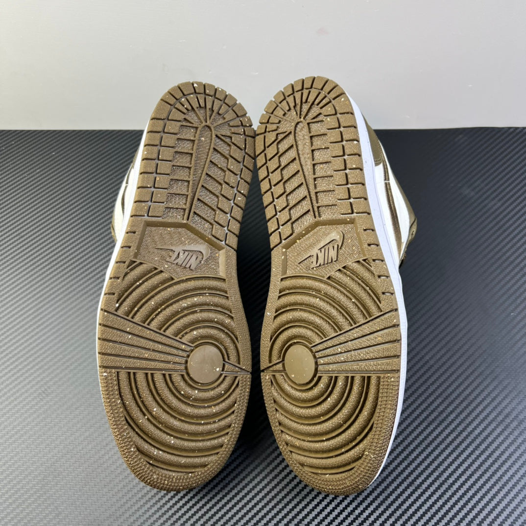 Outsoles of low-top sneakers in olive with circular traction and patterned grooves