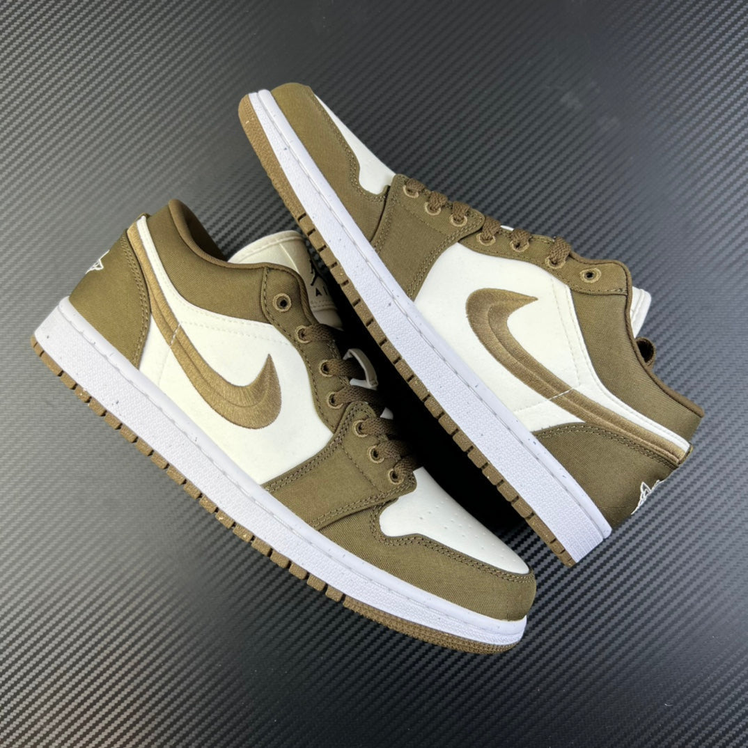 Pair of low-top sneakers in olive and white, side-by-side with lace-up design