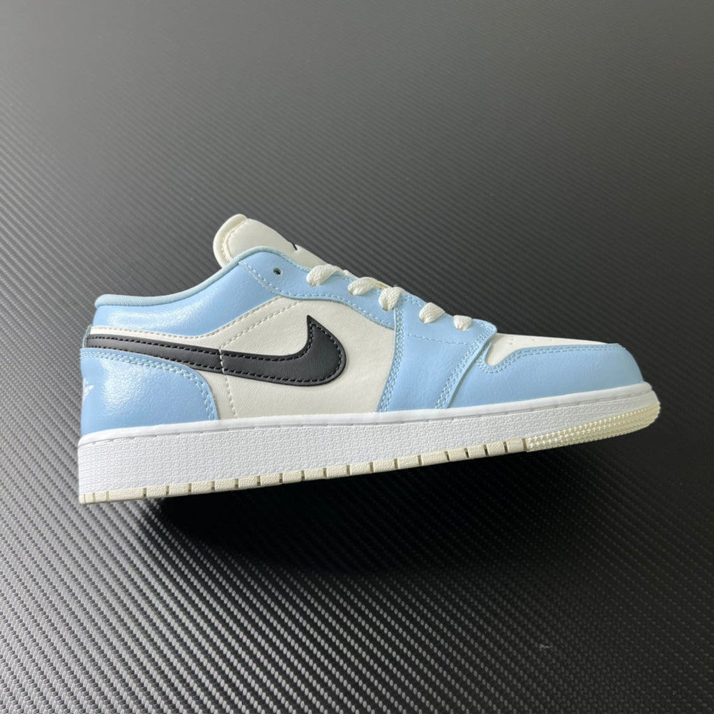 Air Jordan 1 Low ice blue sneakers with white laces and black swoosh detail