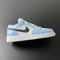 Air Jordan 1 Low ice blue sneakers with white laces and black swoosh detail