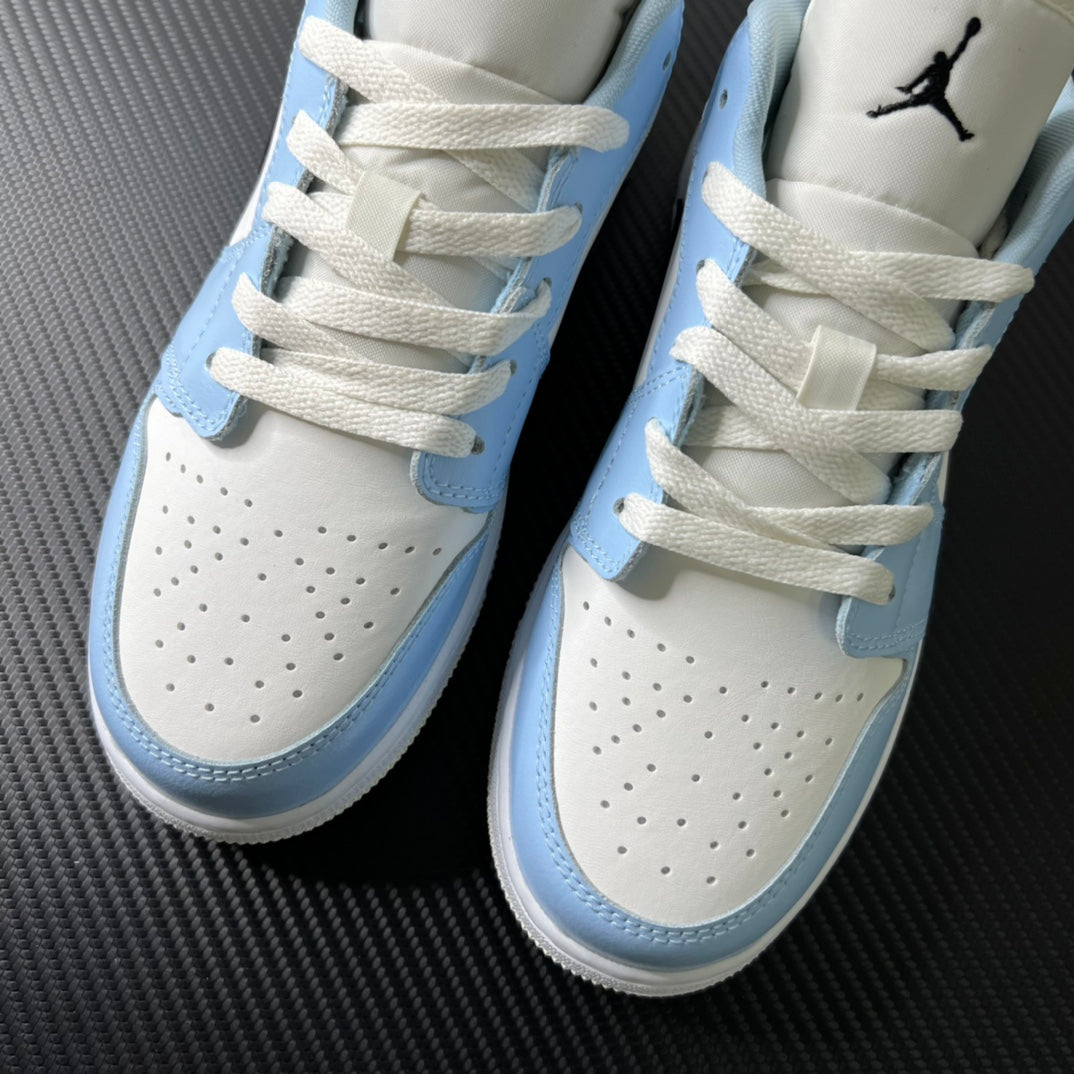 Air Jordan 1 Low front view with perforated toe, ice blue accents, and white laces