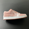 Air Jordan 1 Low pink velvet suede sneakers with white midsole and pink laces