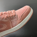 Air Jordan 1 Low pink suede sneakers, side panel and swoosh detail