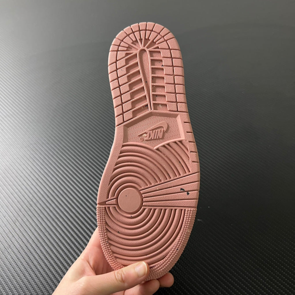 Air Jordan 1 Low sneaker outsole in pink with traction tread pattern