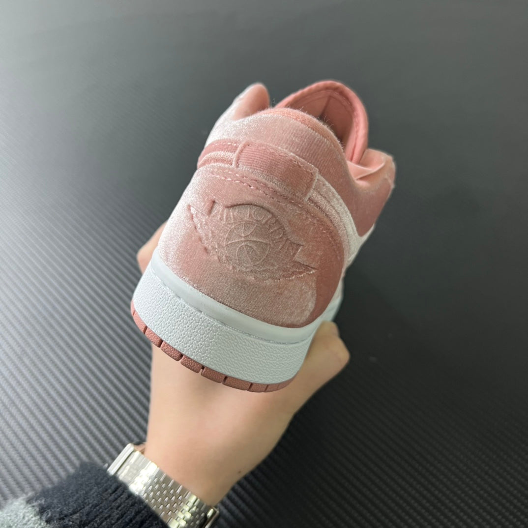 Air Jordan 1 Low pink velvet suede sneakers with heel branding and white midsole