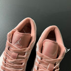 Air Jordan 1 Low pink suede sneakers with inner lining and lace loops