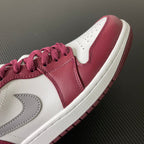Bordeaux and white low-top sneakers with gray stitched swoosh and lace detail