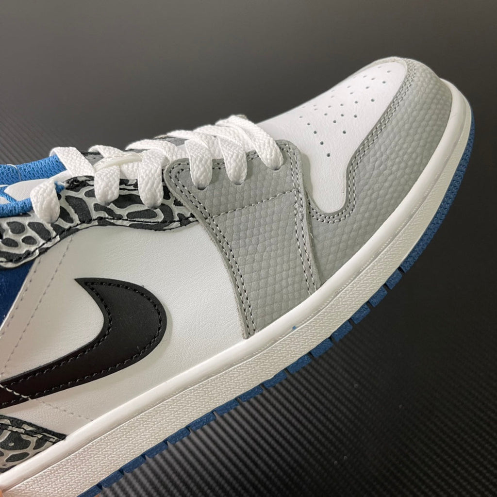 Low-top sneaker side view in white with blue outsole stripe and black swoosh