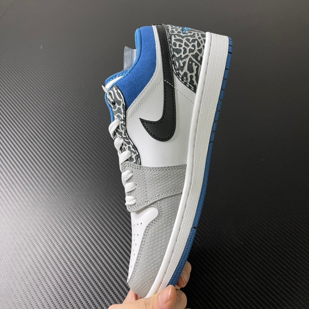 Low-top sneaker back and side view with blue collar and speckled heel panel