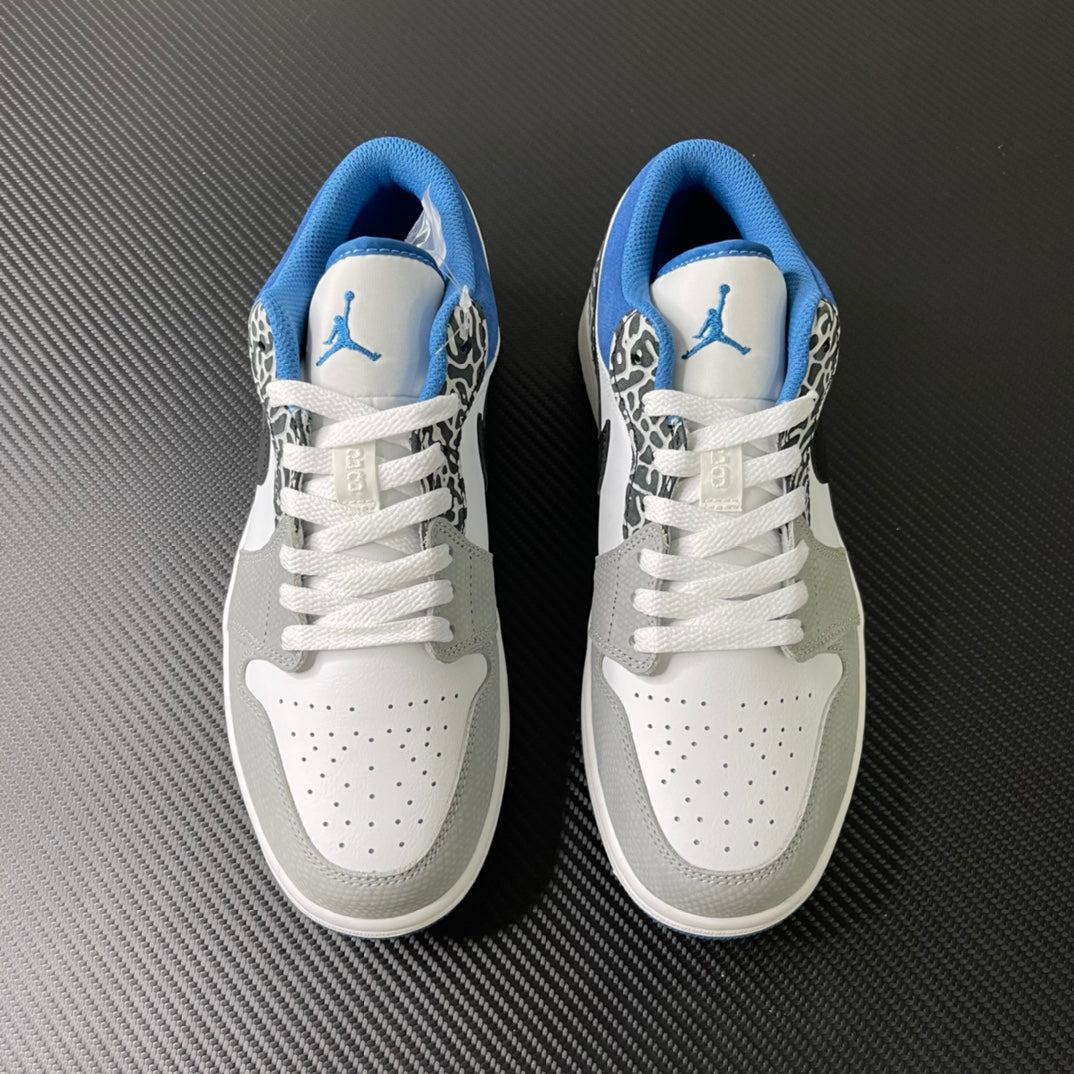 Pair of white low-top sneakers with blue interior and leopard-patterned overlays