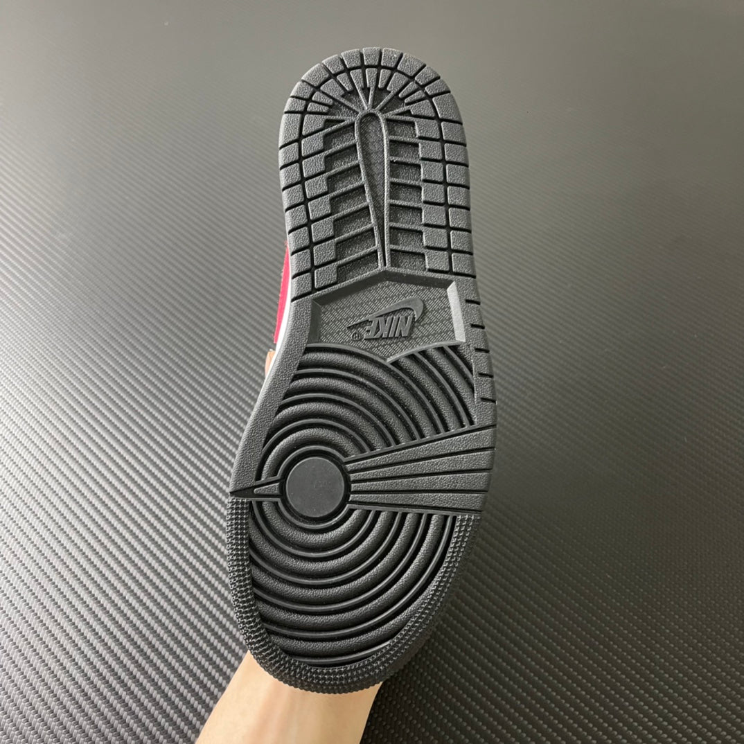 Rubber outsole for black and white low-top sneakers with red accent