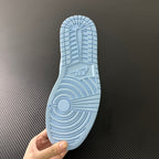 Light blue sneaker outsole with traction tread pattern