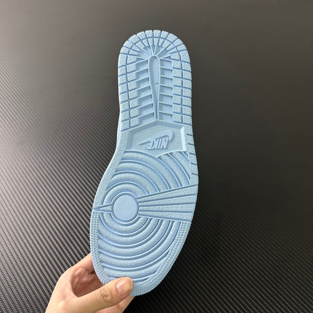 Light blue sneaker outsole with traction tread pattern
