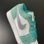 Air Jordan 1 Low sneaker side and heel in teal suede with white leather and laces