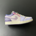 Low-top sneakers with lilac and cream panels, lime-green laces