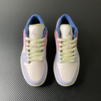 Pair of low-top sneakers, lilac and cream uppers with lime-green laces