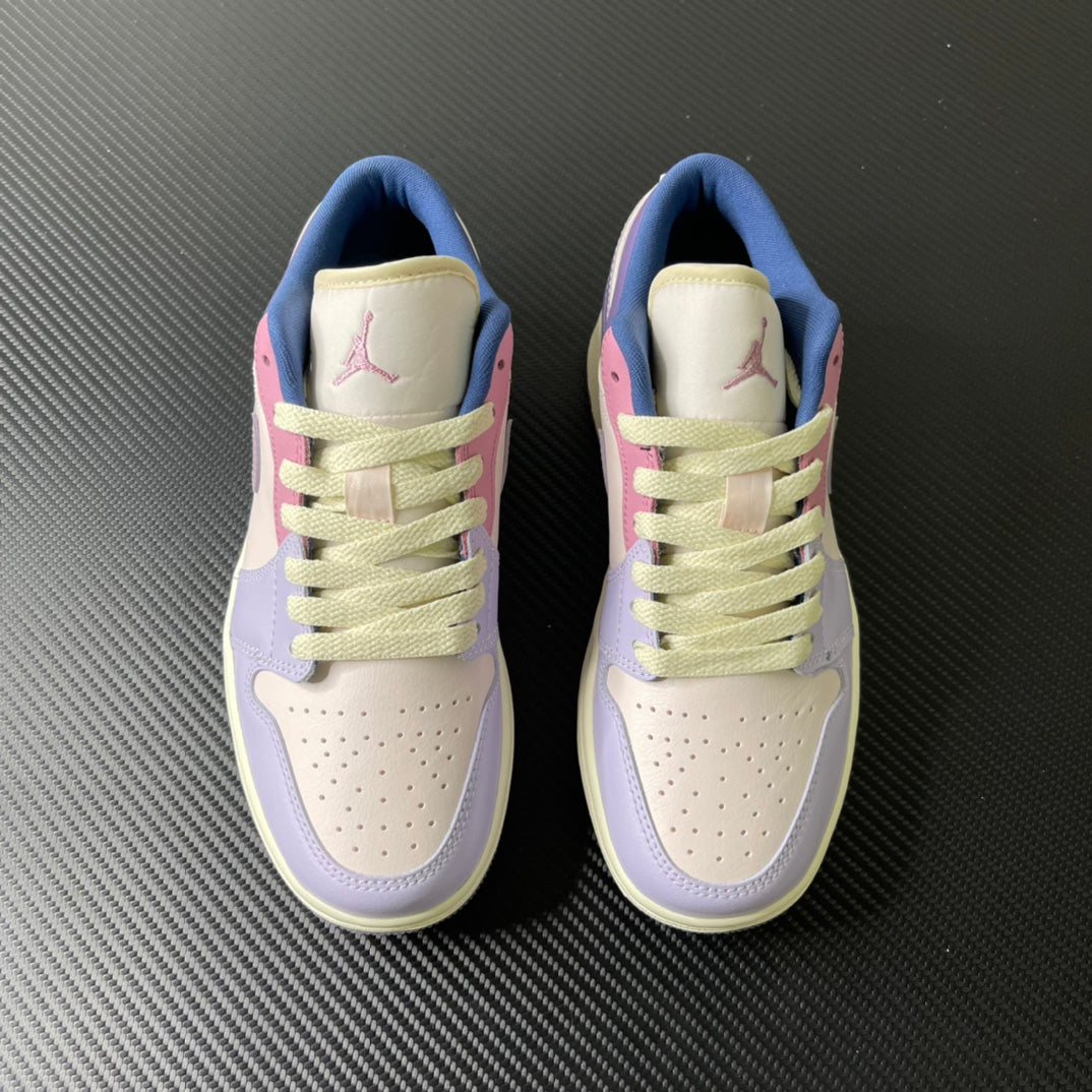 Pair of low-top sneakers, lilac and cream uppers with lime-green laces