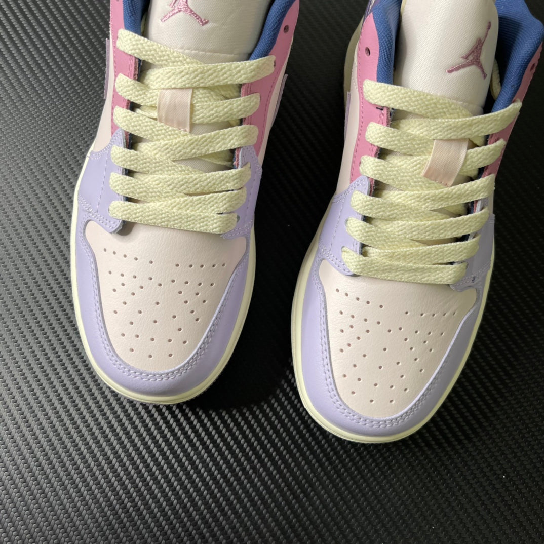 Two low-top sneakers front view, cream toe and lilac overlays with lime-green laces