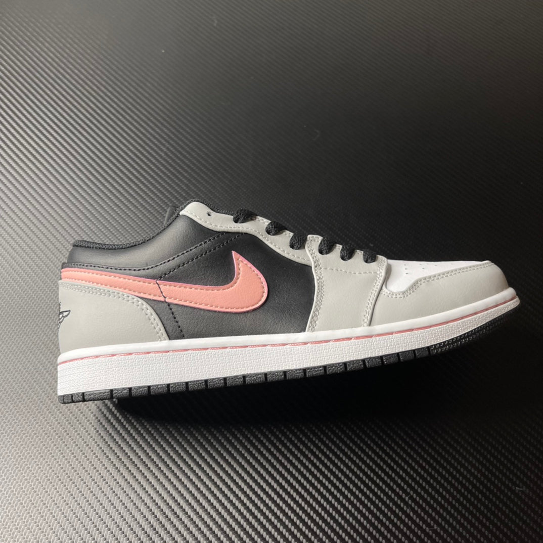 Low-top Air Jordan 1 sneakers, white and black with pink Swoosh