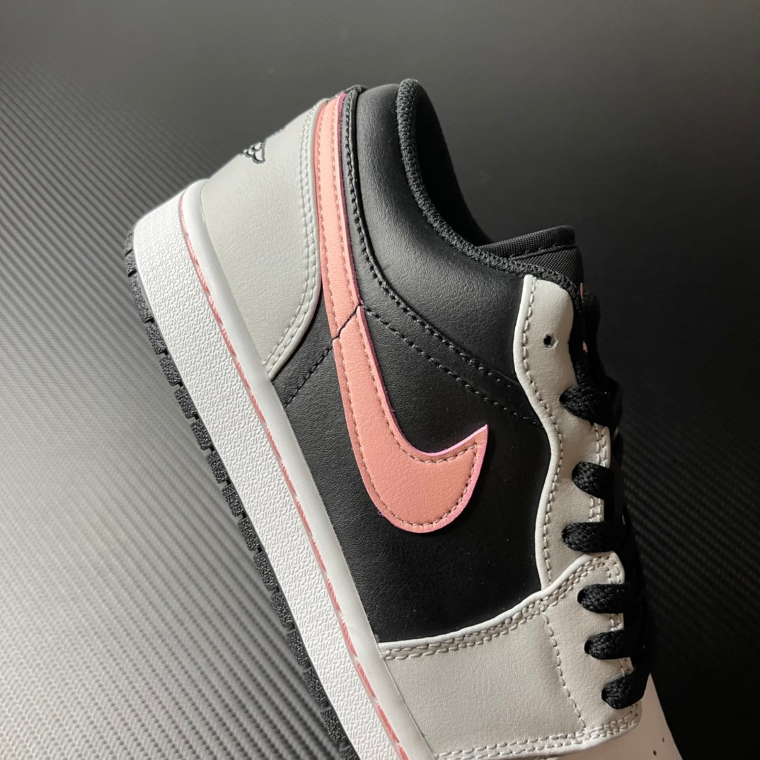 Low-top Air Jordan 1 heel and side, black leather with pink swoosh and white collar
