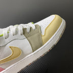 Low-top sneaker side panel close-up in white with olive suede and neon trim