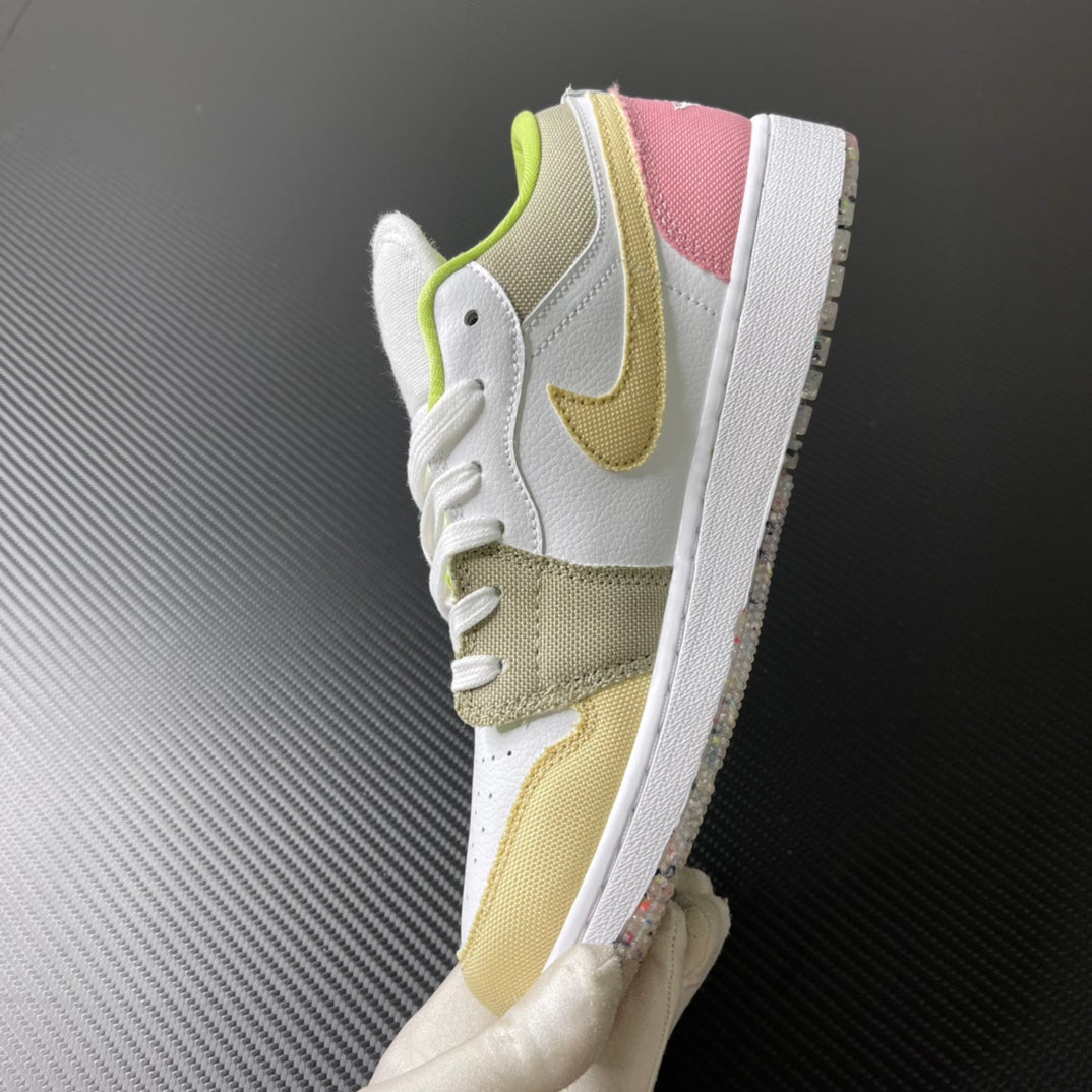 Low-top sneaker side and toe in white with olive and yellow accents