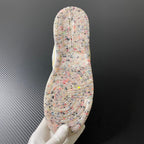 Low-top sneaker outsole in speckled light pink, white and multicolor flecks
