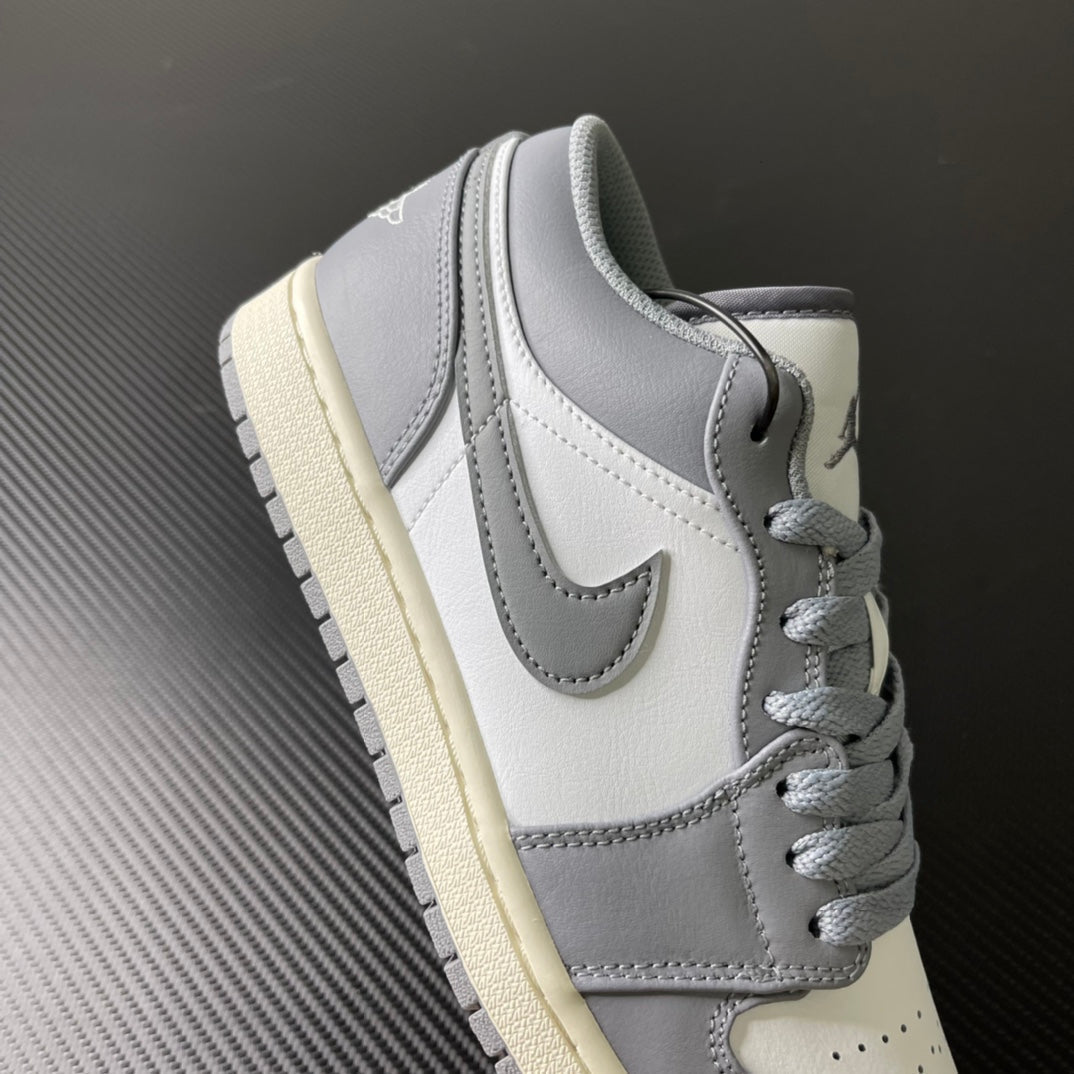 Low-top sneakers, light gray and white leather with padded collar and lace-up