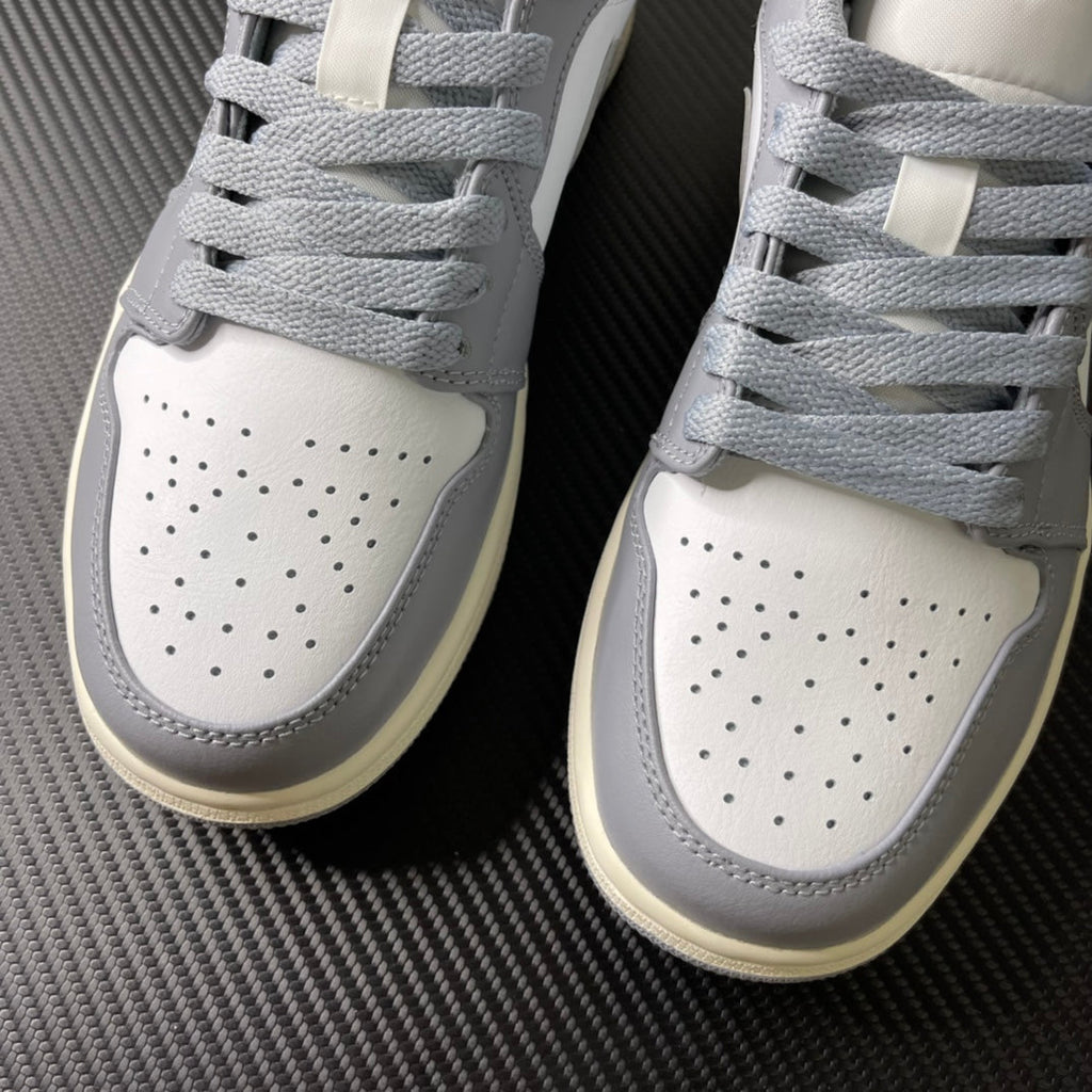 Low-top sneakers, perforated toe box in white with light gray overlays