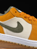 Orange suede and white low-top sneakers with olive Nike swoosh and orange laces.