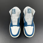 Pair of mid-top sneakers facing upward with blue and white panels and heel logos.