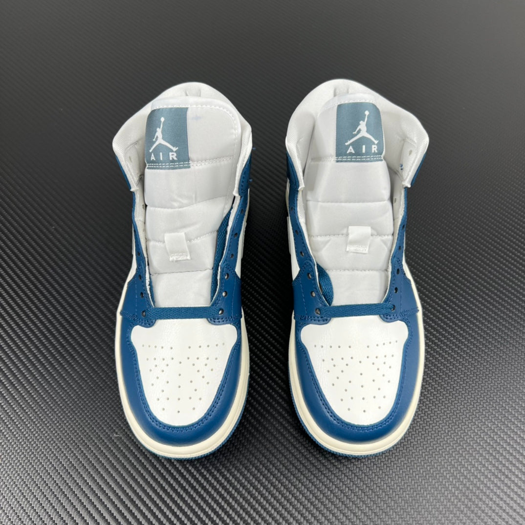 Pair of mid-top sneakers facing upward with blue and white panels and heel logos.