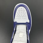 Mid-top sneakers toe box in white with purple-blue overlays and ventilation perforations