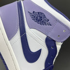 Mid-top sneakers quarter panel with Air Jordan wings logo and purple-blue Swoosh