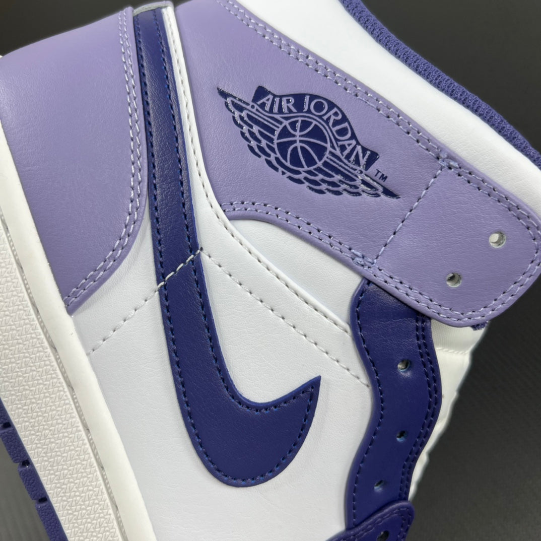 Mid-top sneakers quarter panel with Air Jordan wings logo and purple-blue Swoosh